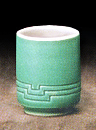 Straight carved teacup