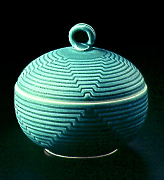 Round carved jar